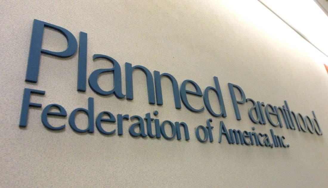 398323 03: A sign hangs in the offices of the Planned Parenthood Federation of America December 7, 2001 in New York City. About 200 Planned Parenthood facilities received anthrax hoax letters last month in Fed Ex packages. (Photo by Mario Tama/Getty Images)