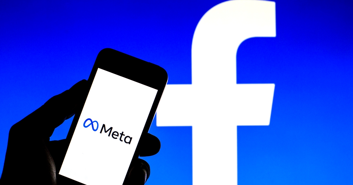 SPAIN - 2021/10/30: In this photo illustration a Meta logo seen displayed on a smartphone with a Facebook logo in the background. (Photo Illustration by Thiago Prudencio/SOPA Images/LightRocket via Getty Images) (Thiago Prudencio/SOPA Images/LightRocket via Getty Images)